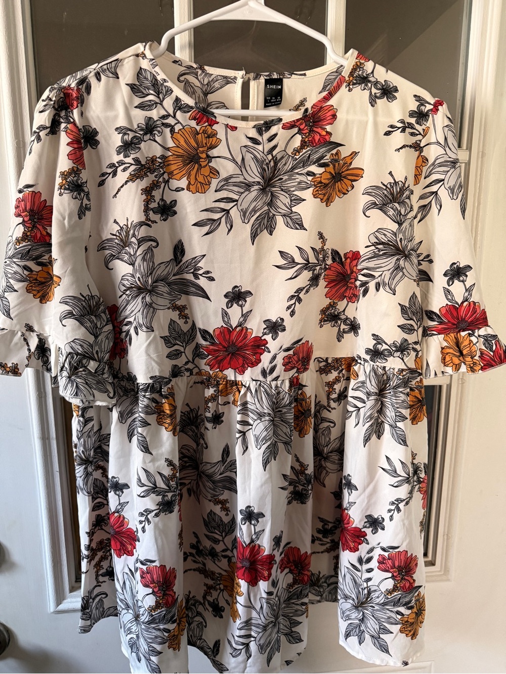 Woman’s Floral Peplum top- White with Red & Mustard Flowers - Picture 3 of 3